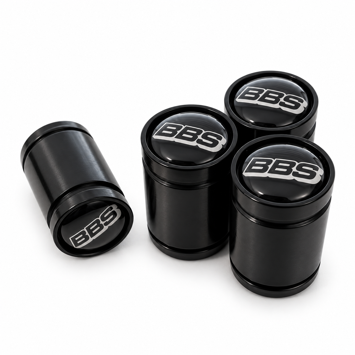 Four black BBS valve caps
