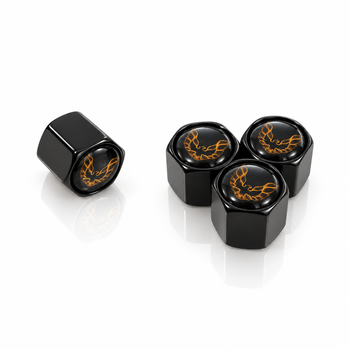 Set of four black hexagonal Pontiac Firebird valve caps with gold bird emblems