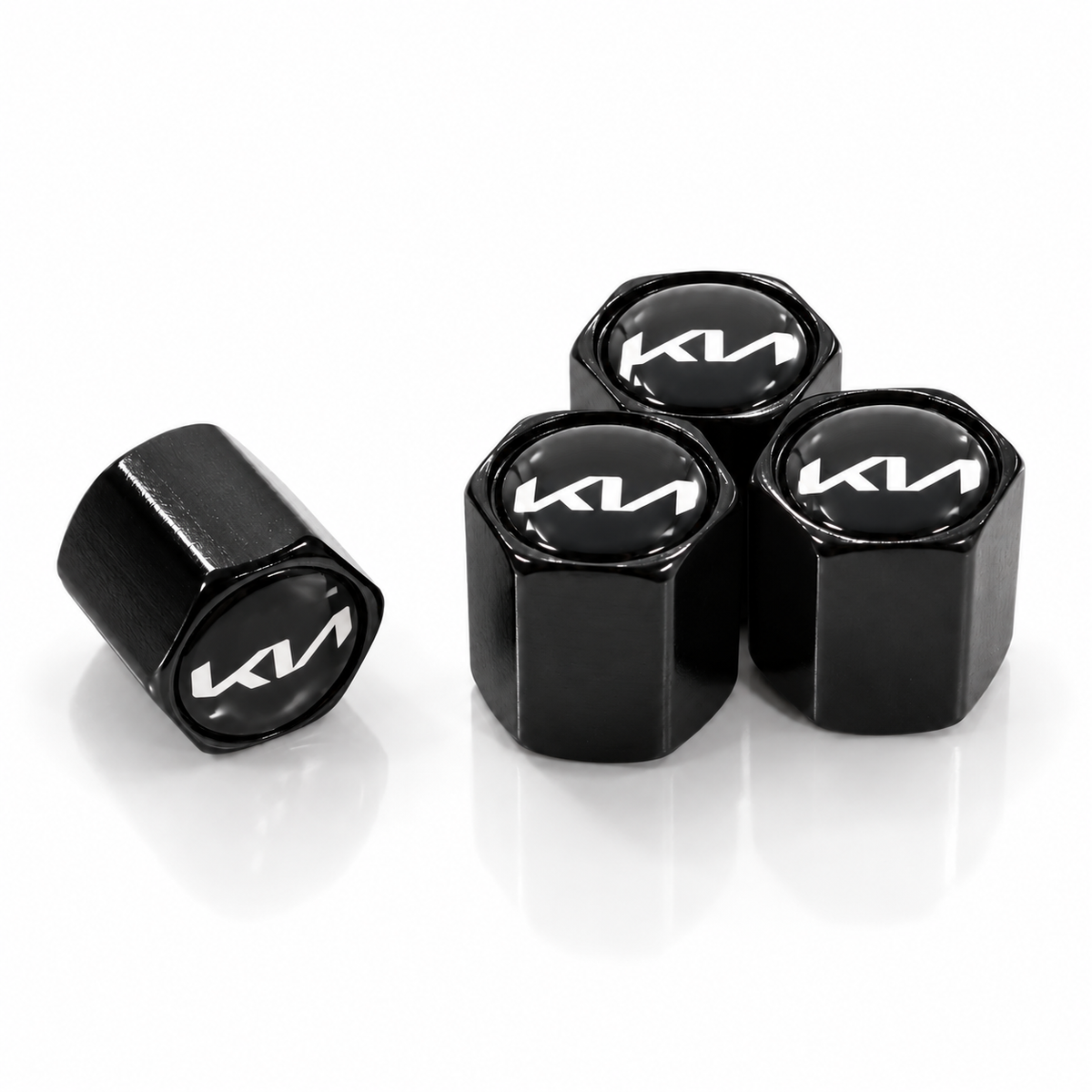 Set of four black Kia logo valve caps with epoxy dome tops