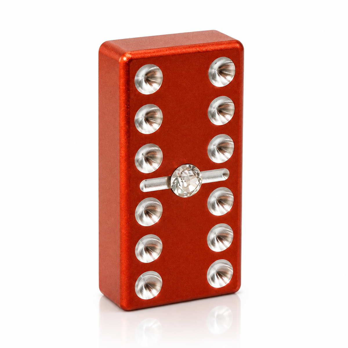 Red billet domino with rhinestone centre, upright on a white studio background.