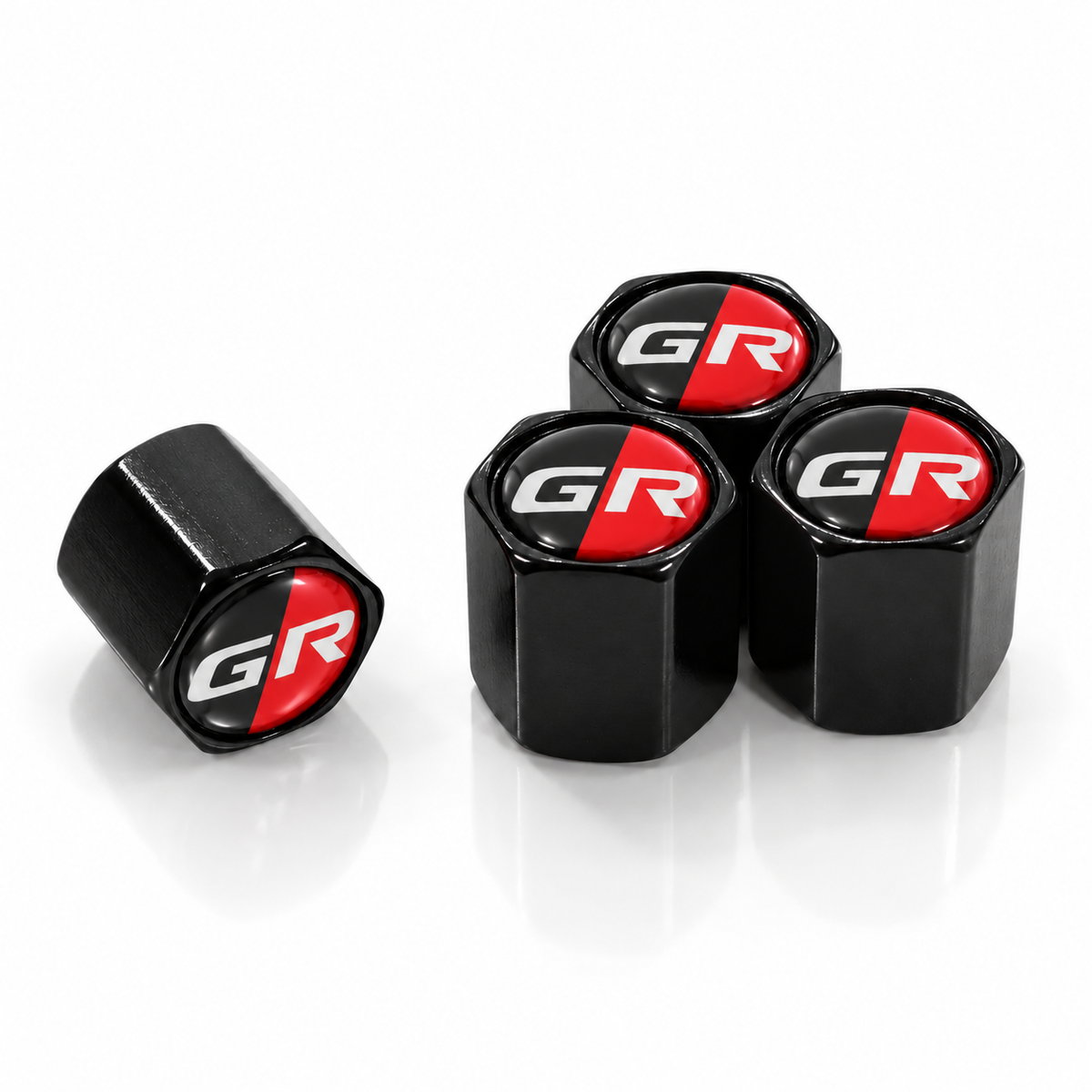 Set of four black GR Racing hex valve caps with red-and-black epoxy logos