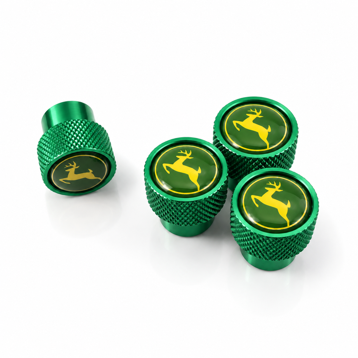Green John Deere oversized valve caps with yellow deer logos and knurled sides, set of 4