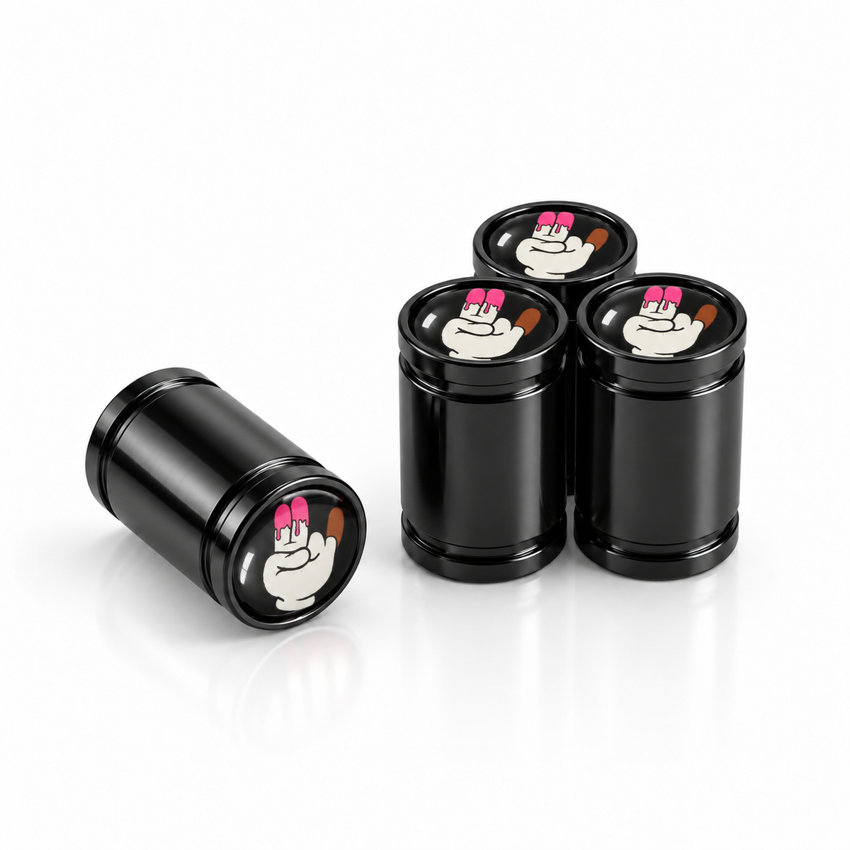 Stink premium valve caps in black with cartoon hand graphics, set of 4